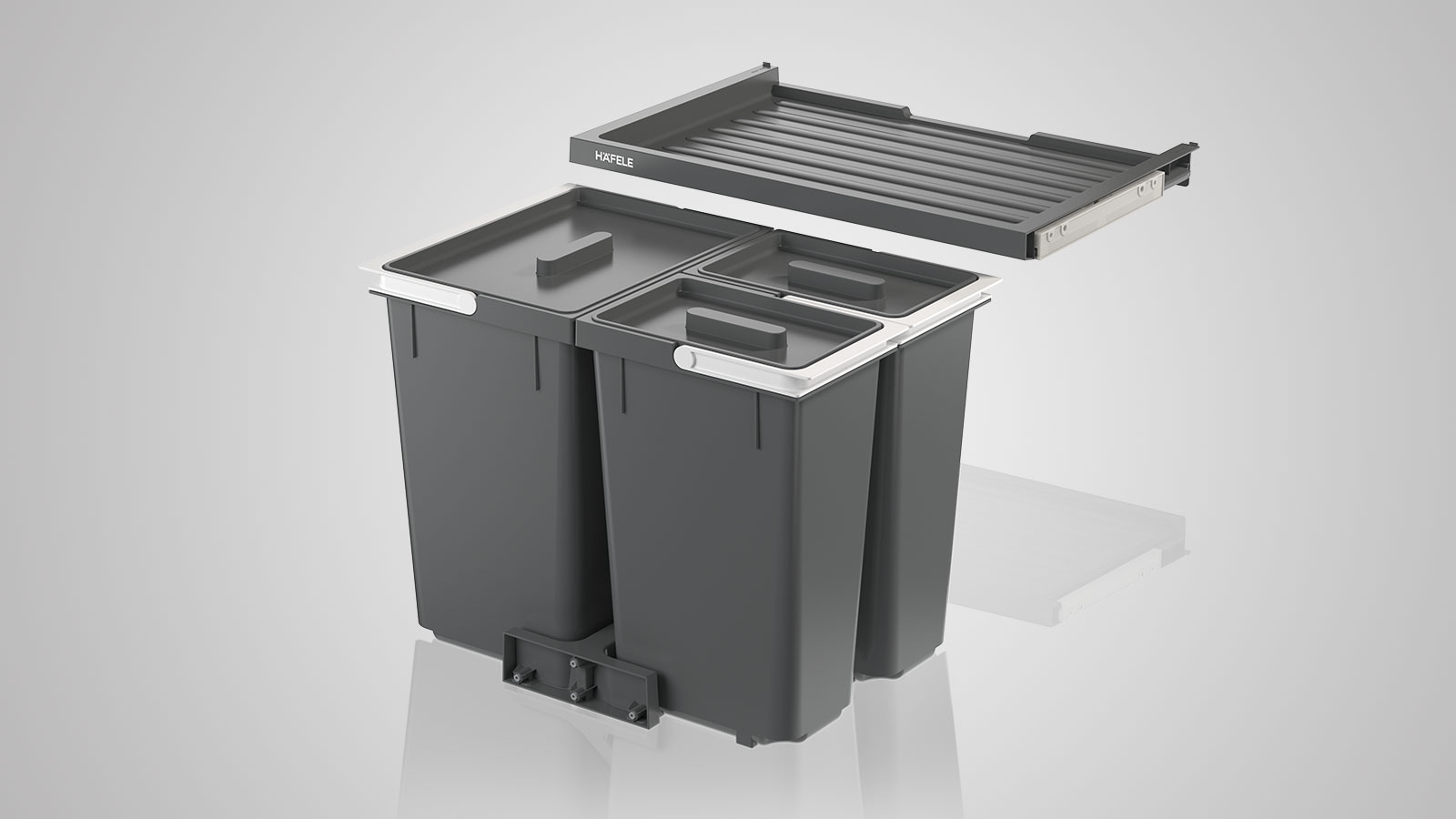 Le nouveau système de tri des déchets Häfele pour coulissants se compose de sept variantes de poubelles en trois hauteurs différentes et de deux modèles de tablettes ou d'un couvercle.